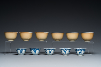 Eleven Chinese blue and white cups and ten saucers, Kangxi