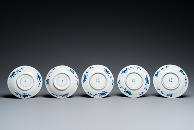 13 Chinese blue and white 'rabbit hunt' cups and 10 saucers, Qianlong mark, 19th C.