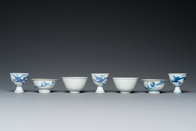 Four Chinese blue and white 'Hatcher cargo' bowls and three stem cups, Transitional period