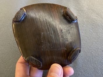 A Chinese hollowed jade libation cup on wooden stand, probably Qing