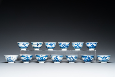 13 Chinese blue and white 'rabbit hunt' cups and 10 saucers, Qianlong mark, 19th C.