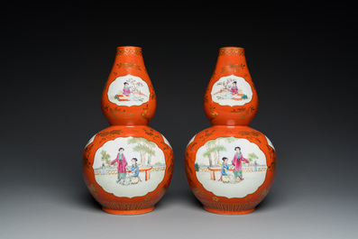 A pair of Chinese coral-ground famille rose double gourd vases, Qianlong mark, Republic