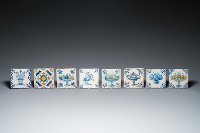 Eight Dutch Delft blue and white and polychrome tiles, 17th C.