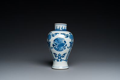 A Chinese blue and white 'cranes' vase and a pair of plates, Kangxi