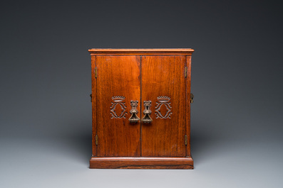 A Chinese huanghuali and hardwood cabinet with bronze fittings for the European market, 19th C.