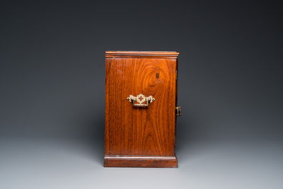 A Chinese huanghuali and hardwood cabinet with bronze fittings for the European market, 19th C.