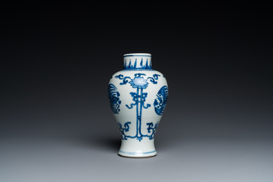 A Chinese blue and white 'cranes' vase and a pair of plates, Kangxi