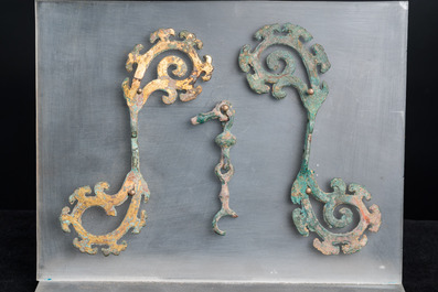 A pair of Chinese gilt bronze bridle ornaments, probably Han