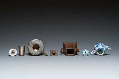 Two Vietnamese blue and white water pipes, a blue and white 'lotus' teapot, a Yixing teapot and a coconut teapot, Kangxi and later