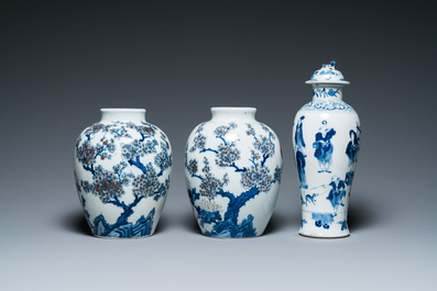 A pair of Chinese blue, white and copper-red vases, a blue and white covered vase and a Canton famille rose box and cover, 19/20th C.