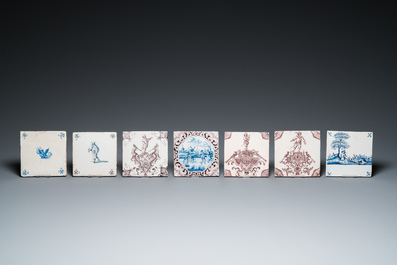 Seven Duch Delft blue and white and manganese tiles, 17/18th C.