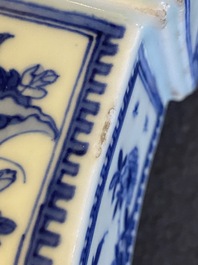 Een Chinese blauw-witte 'gu' vaas met erotisch decor onderop, Kangxi