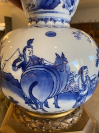 A Chinese blue and white double gourd vase mounted as a lamp, Transitional period