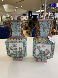 A pair of Chinese famille rose turquoise-ground vases, Qianlong mark, 19/20th C.