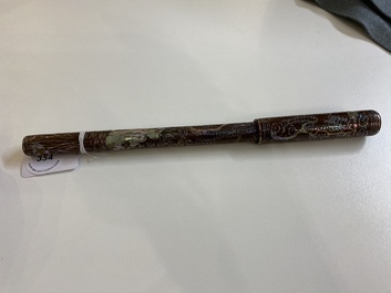 A Chinese mother-of-pearl-inlaid brown lacquer brush, Ming