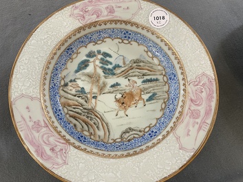 A pair of Chinese famille rose 'boy on buffalo' plates, Yongzheng/Qianlong