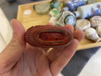 15 Chinese snuff bottles, mostly porcelain, hardstone and glass, 19/20th C.