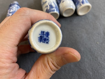 Five Chinese blue and white snuff bottles, 19th C.