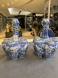 A pair of Chinese blue and white flower vases, 19th C.