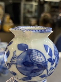 A pair of Chinese blue and white flower vases, 19th C.
