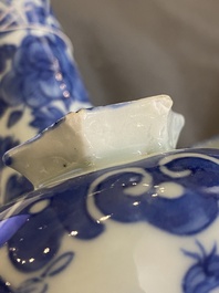 A pair of Chinese blue and white flower vases, 19th C.