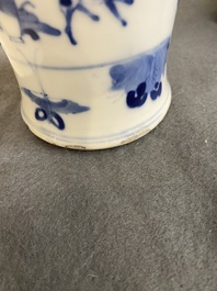 A pair of Chinese blue, white and copper-red vases, a blue and white covered vase and a Canton famille rose box and cover, 19/20th C.