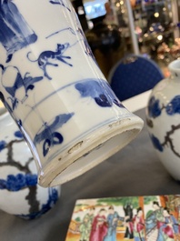 A pair of Chinese blue, white and copper-red vases, a blue and white covered vase and a Canton famille rose box and cover, 19/20th C.