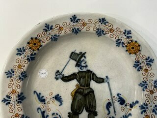 A polychrome Italian maiolica 'soldier' dish, workshop of Giacomo Mancini, Deruta, 1st half 17th C.