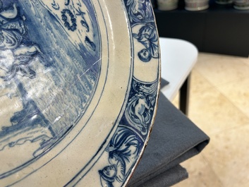 A Dutch Delft blue and white 'The abduction of Europa' dish, 1st quarter 18th C.