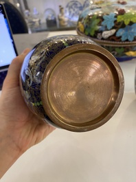 A pair of Chinese cloisonn&eacute; vases, a large covered box and a bowl, 19/20th C.