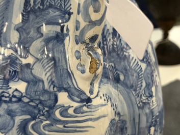 A large twisted Dutch Delft blue and white pewter-mounted ewer, 17th C.