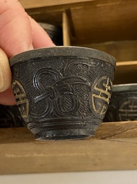 20 Chinese coconut 'Shou' cups in wooden presentation boxes, 19/20th C.