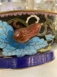 A pair of Chinese cloisonn&eacute; vases, a large covered box and a bowl, 19/20th C.