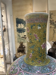 A large Chinese famille rose yellow-ground bottle vase, Qianlong mark, 19th C.