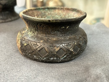 A Chinese ritual bronze 'hu' wine vessel and cover, Eastern Zhou or earlier