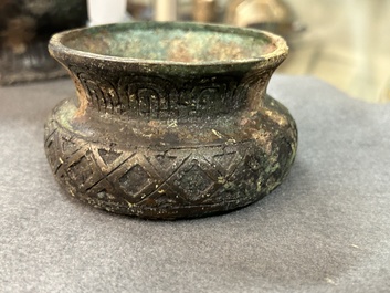 A Chinese ritual bronze 'hu' wine vessel and cover, Eastern Zhou or earlier