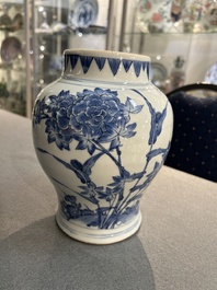 A Chinese blue and white vase with birds among blossoming branches, Transitional period