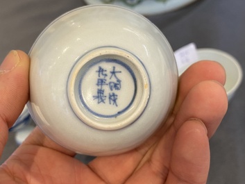 Four Chinese blue and white 'Hatcher cargo' bowls and three stem cups, Transitional period