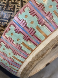 A large Chinese famille rose fish bowl on wooden stand, 19th C.