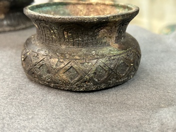 A Chinese ritual bronze 'hu' wine vessel and cover, Eastern Zhou or earlier