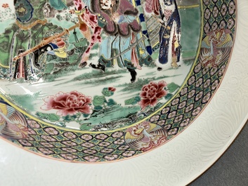 A rare large deep Chinese famille rose dish with fine figurative design, Yongzheng