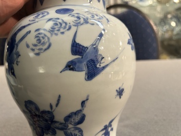 A Chinese blue and white vase with birds among blossoming branches, Transitional period