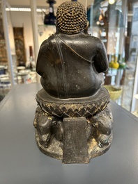 Een Thaise bronzen Boeddha met sporen van vergulding, 19e eeuw