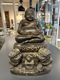 A Thai bronze Buddha with traces of gilding, 19th C.