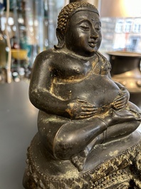 Een Thaise bronzen Boeddha met sporen van vergulding, 19e eeuw