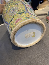 A Chinese famille rose yellow-ground 'phoenix' vase and a large spittoon, 19th C.