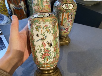 A Chinese octagonal famille rose 'mandarin' dish and a pair of bronze-mounted Canton vases, Qianlong and 19th C.