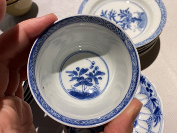 Eleven Chinese blue and white cups and ten saucers, Kangxi