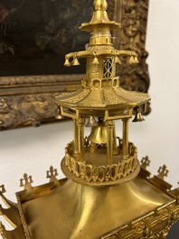 An impressive three-piece gilt bronze chinoiserie clock garniture, France, 19th C.