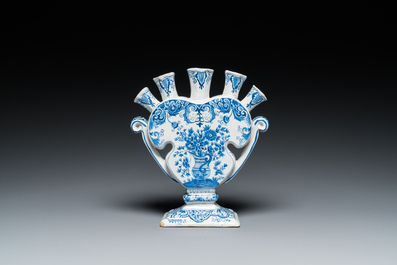 A heart-shaped Dutch Delft blue and white tulip vase with flower vases, 19th C.